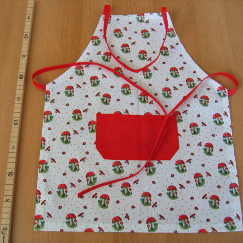 Schürze (Kinder) Baumwolle weiß mit Pilzen und Marienkäfern (46x38)