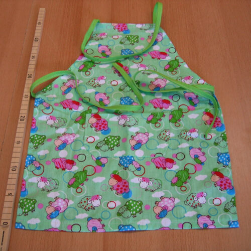 Schürze (Kinder) Baumwolle hellgrün mit bunten Schafen (46x36)